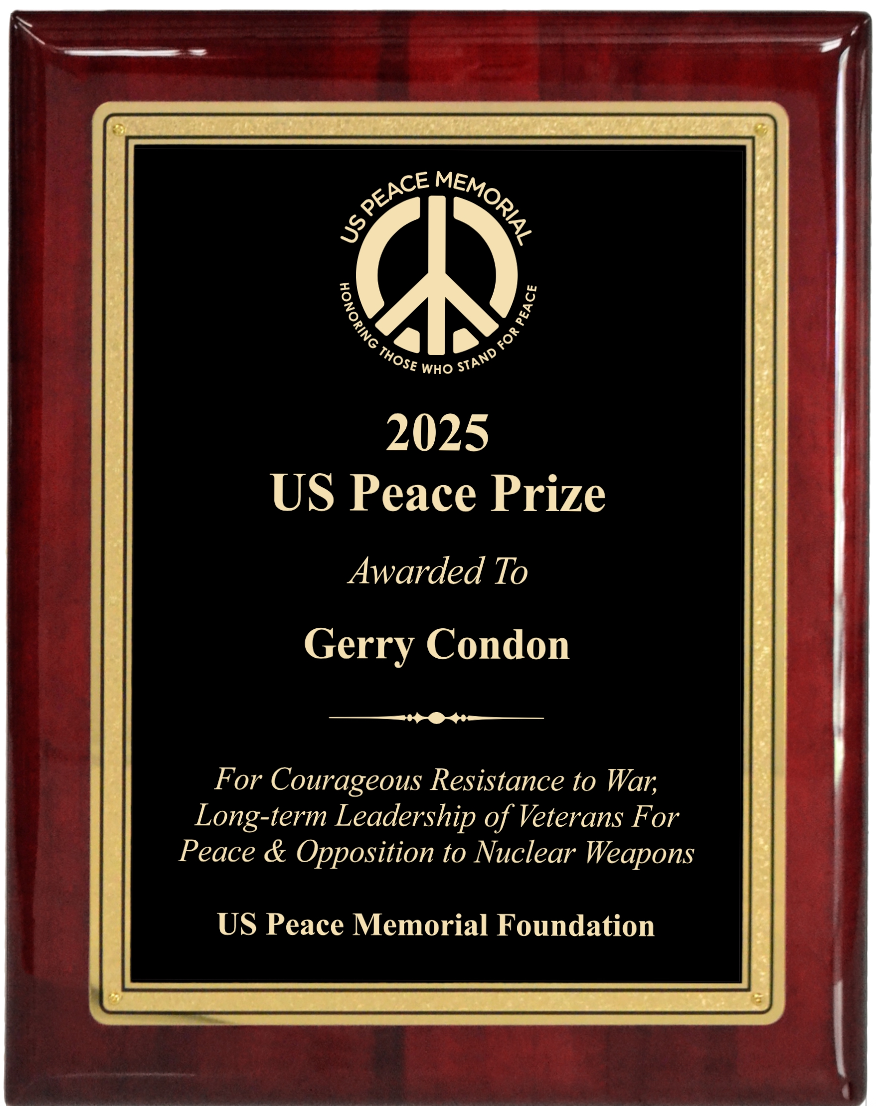 A plaque with a peace symbol on it

AI-generated content may be incorrect.