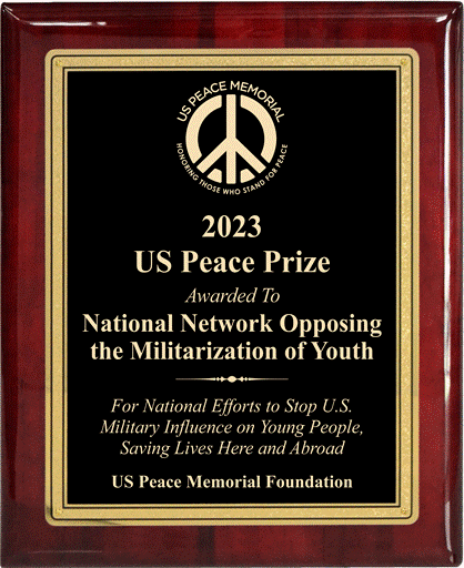 A close-up of a plaque

Description automatically generated