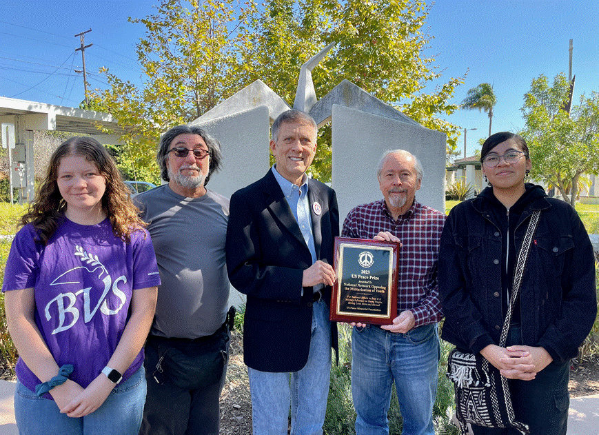 A group of people posing for a photo

AI-generated content may be incorrect.