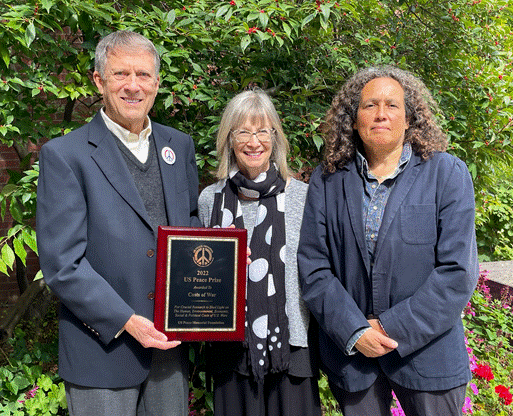 A group of people posing for a photo

Description automatically generated
